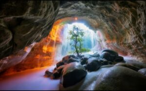 A mystical cave with shimmering walls adorned w 1